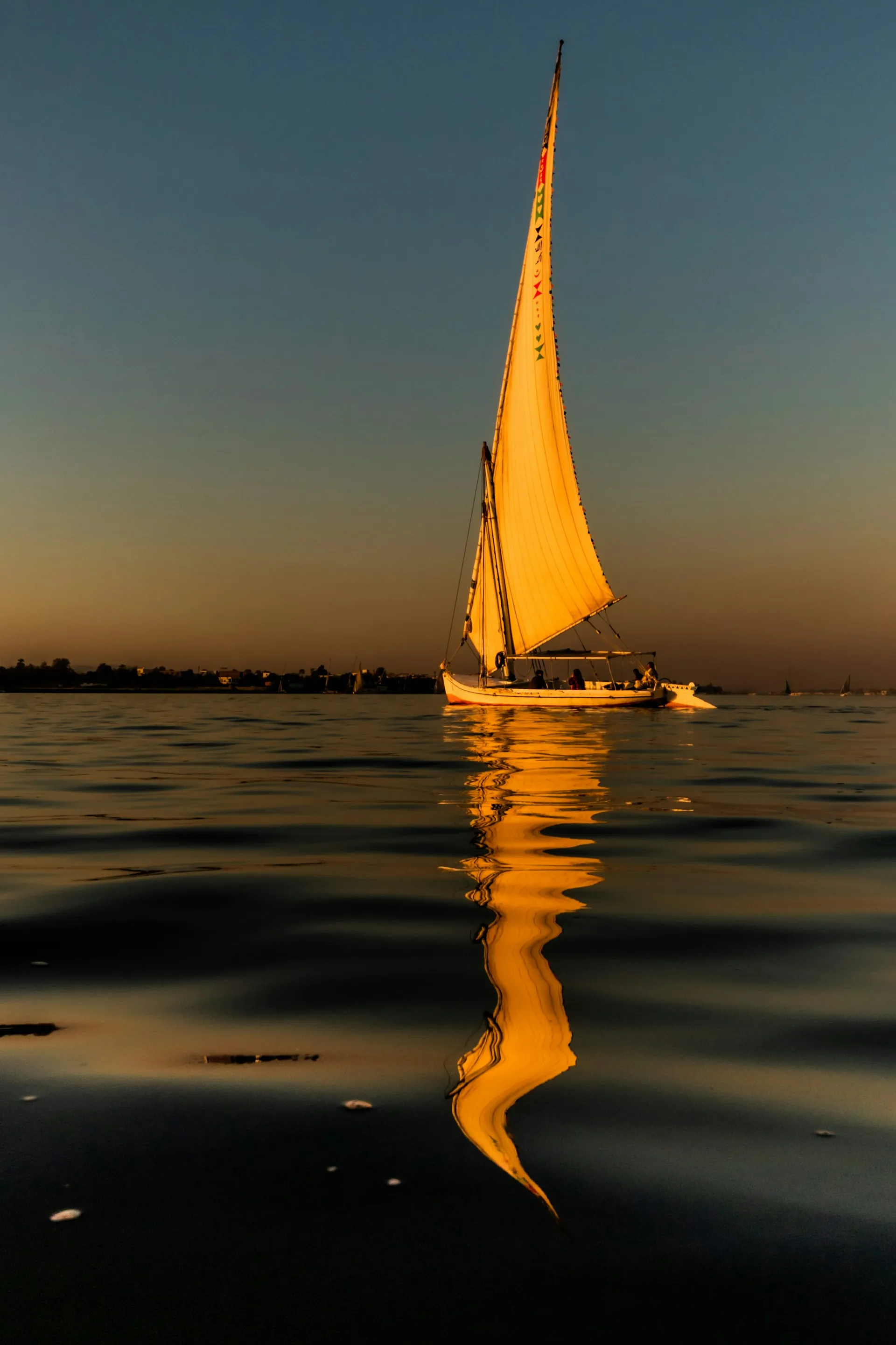 Esna — Felucca sailing on the Nile in Upper Egypt between Luxor and Esna