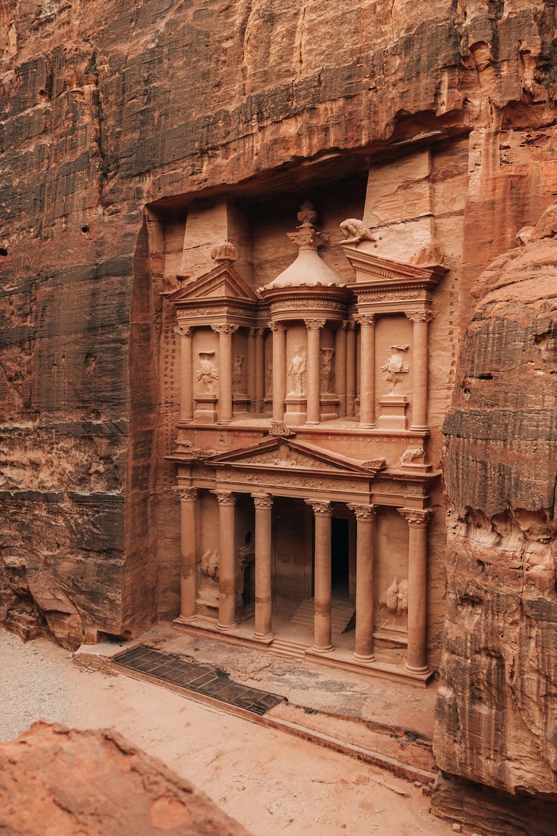 The Treasury (Al-Khazneh) carved into the rock at Petra, Jordan