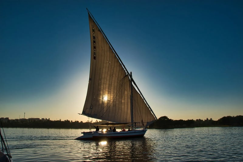 Felucca at sunset on the Nile near Aswan and Kom Ombo